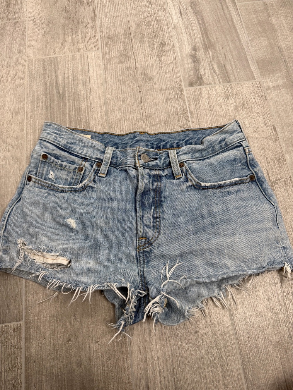 Levi’s 501 denim cut off shorts butterfly distressed frayed hems size 26